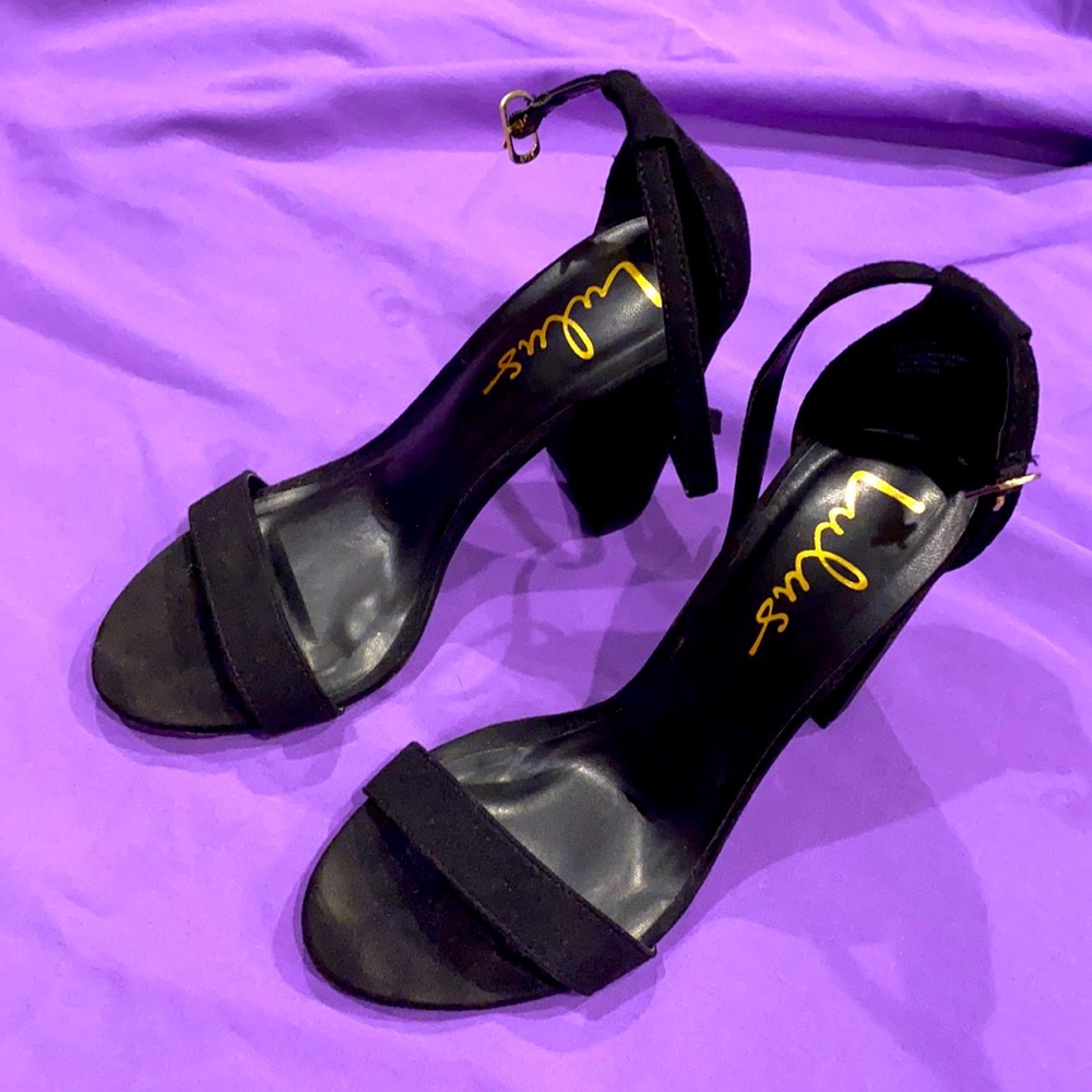 Brand new never worn black heels lulus size 7